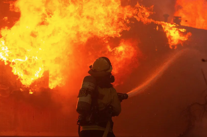 A firefighter working to control the fire. Pacific Palisades, Los Angeles, California, United States, January 7, 2025