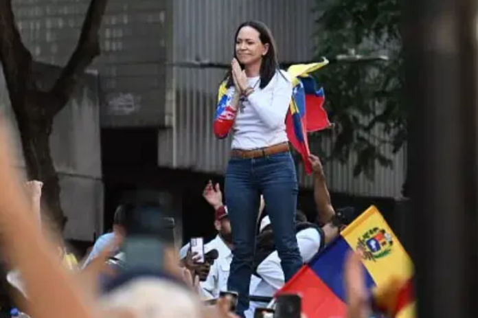 Maria Corina Machado joined a protest rally in Caracas yesterday